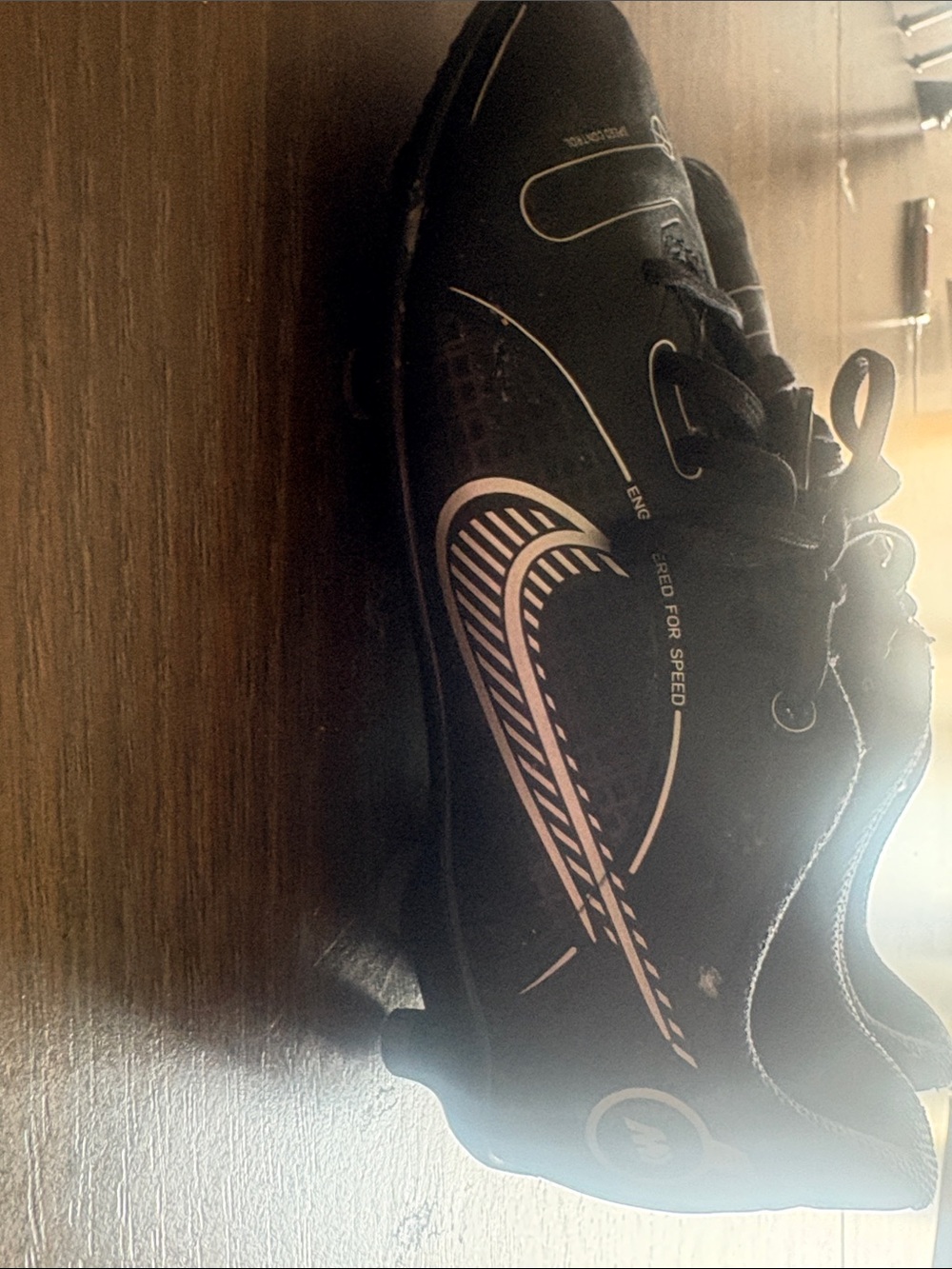 Nike Kids Black Soccer Cleats with White Swoosh